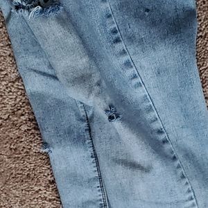 Womens distressed light blue jeans